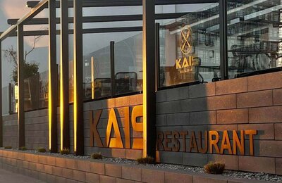 Kais Restaurant Fassade bei Sonnenuntergang | © Lasertag Arena GmbH